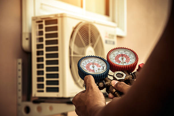 Professional Heat Pump Repair technician working in Hanover, MA